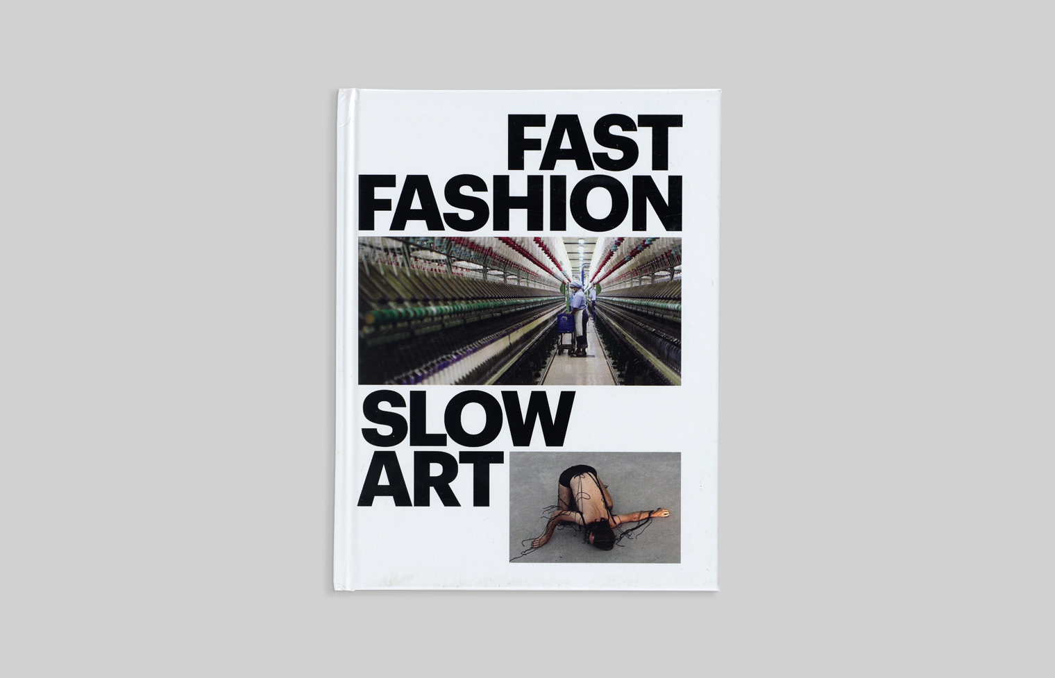 The cover juxtaposes a factory scene with a photo of performance art.