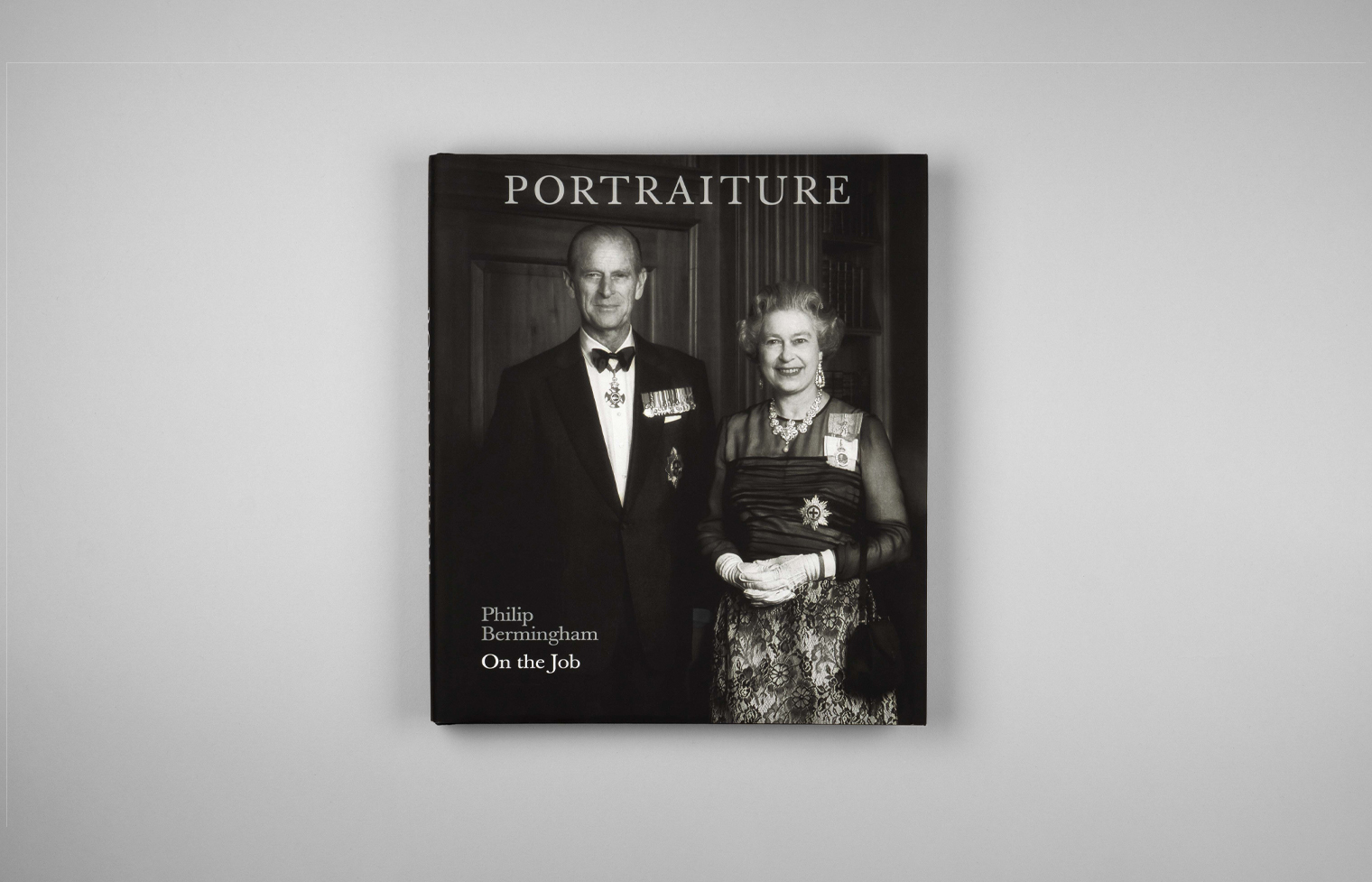 The cover features Prince Philip, Duke of Edinburgh, and Queen Elizabeth II who has her hands folded in front of her.