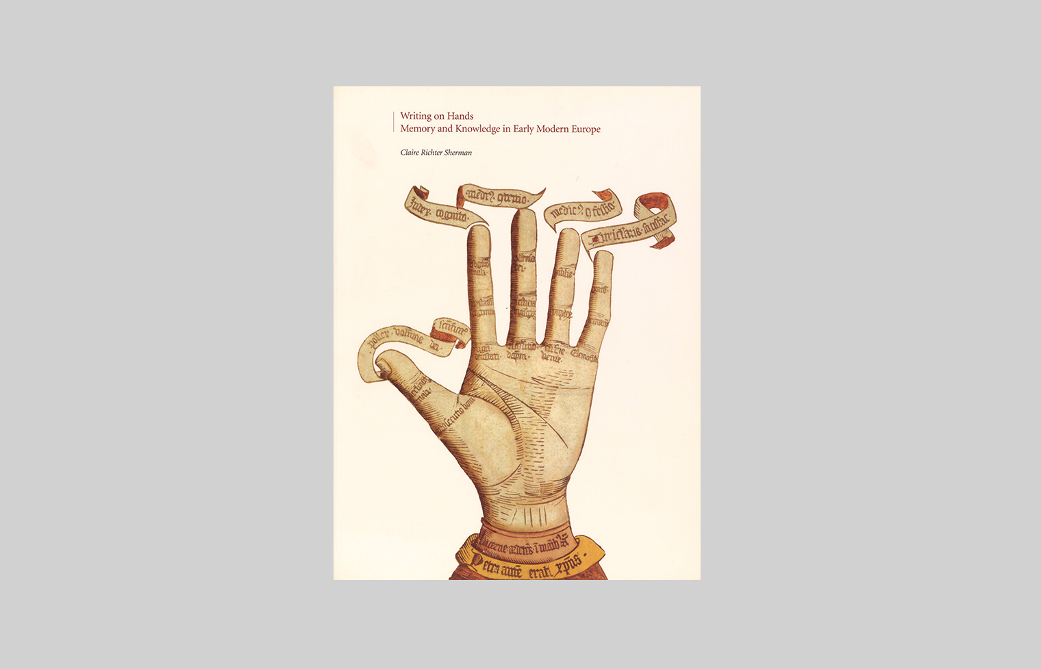 Front cover shows an illustration of a hand from the hand-colored woodcut from 1466, The Hand as the Mirror of Salvation.