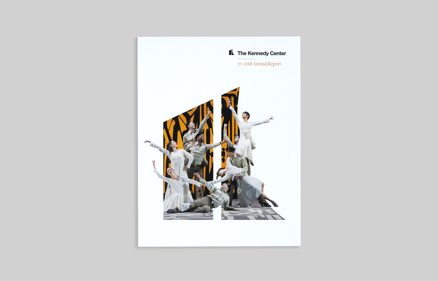 Cover of the 2017 annual report shows a dance performace with women in white dresses and men in military uniforms.