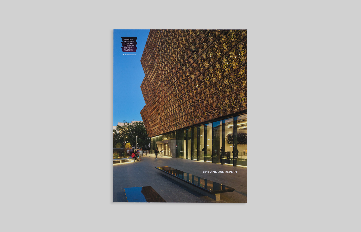 The distinctive building is featured on the cover is meant to evoke the three-tiered crowns used in Yoruban art from West Africa.