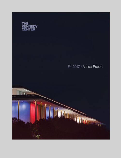 Cover of the 2017 annual report for The Kennedy Center shows the facade lit up in red, white, and blue.