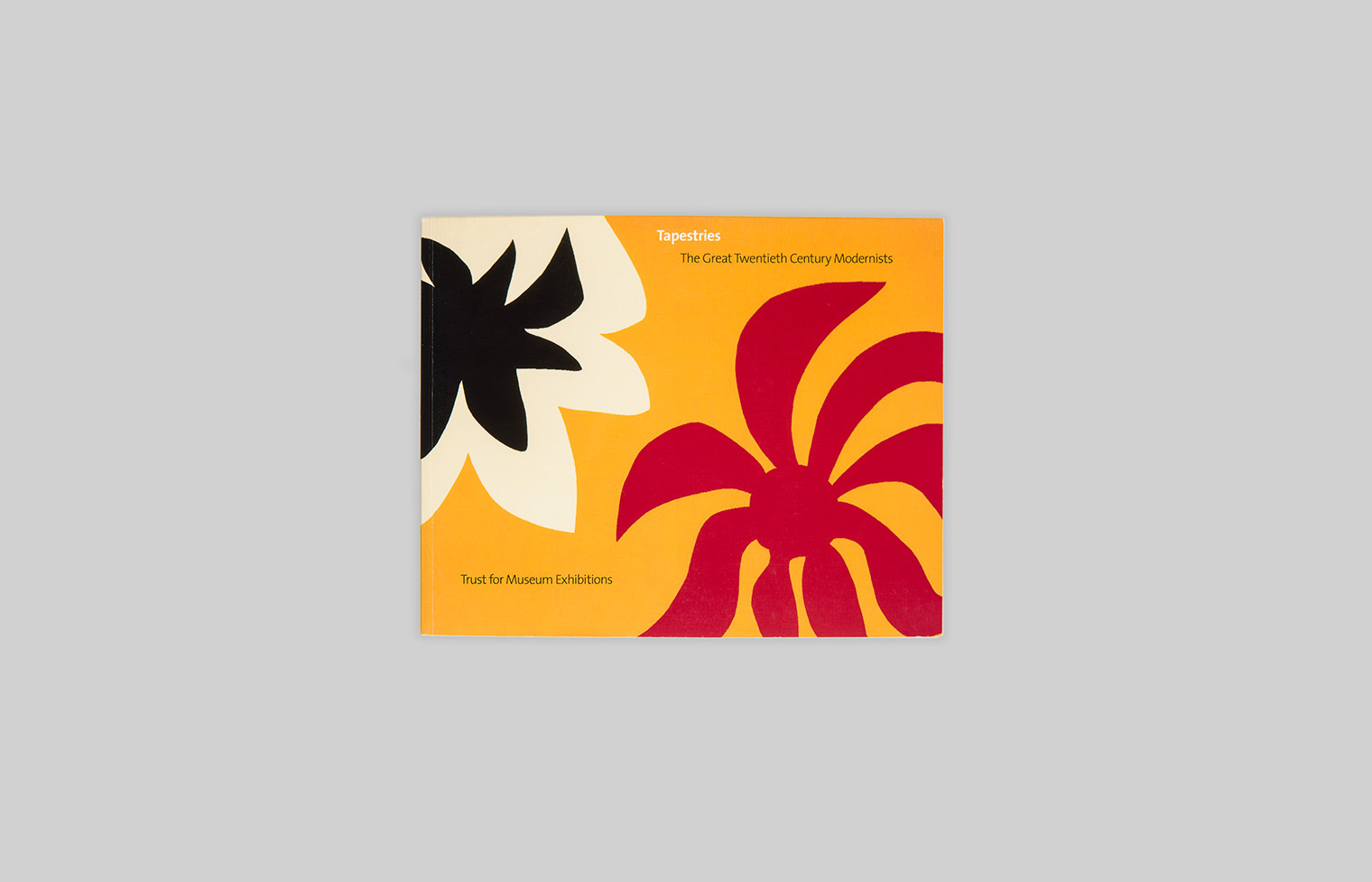 Cover features Alexander Calder’s Soleil Rouge, a red sun over a yellow background with a floral shape in black and beige.