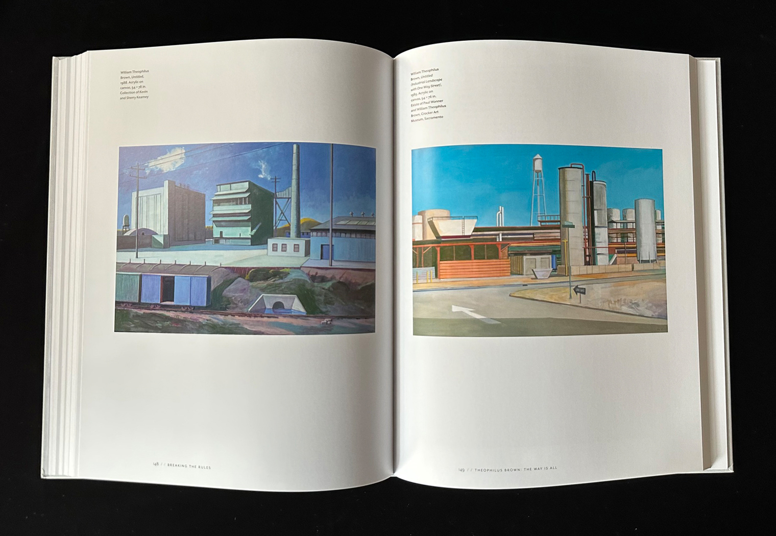 Interior spread of paintings of industrial parks by Theophilus Brown